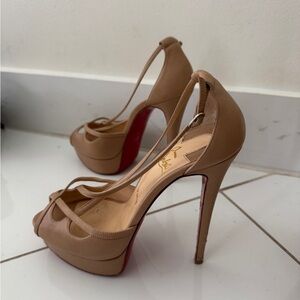 Christian Louboutin Tan Heels, Size 9.5, Pre-loved with visible wear.